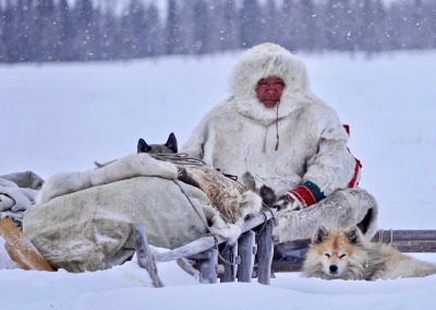 Nomadic Nenets man in gus reindeer-fur coat